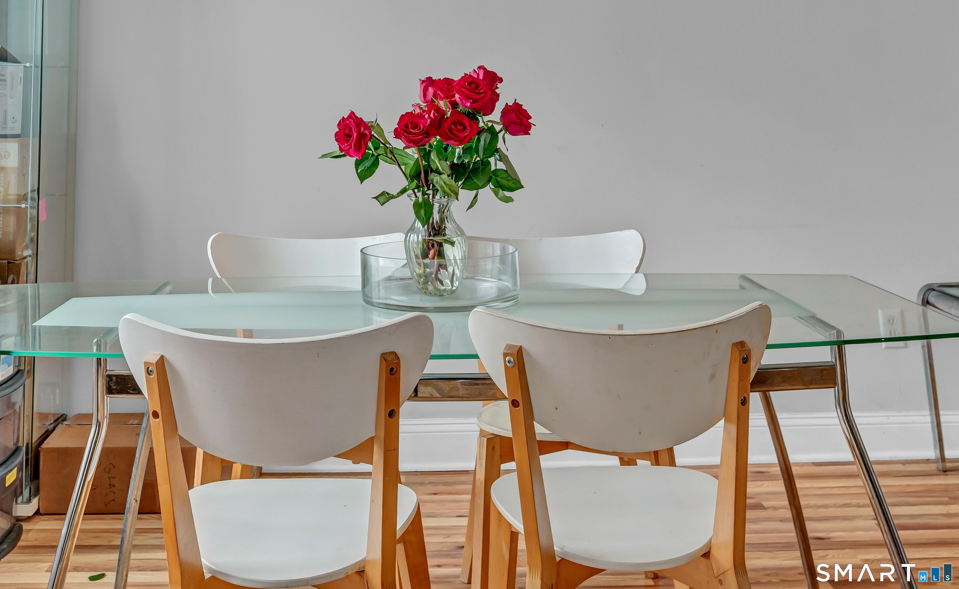 14 Newtown Road, Unit A5 Danbury, CT 06810 - Photo 6 of 27 a view of a dining room with furniture window and wooden floor