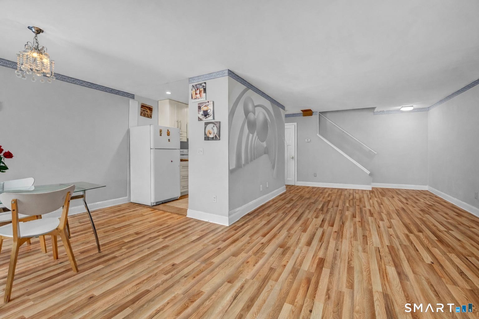 14 Newtown Road, Unit A5 Danbury, CT 06810 - Photo 8 of 27 a view of empty room with wooden floor