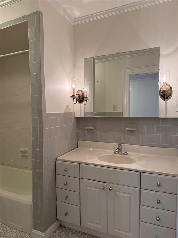112 Pinckney Street, Unit 11 Boston, MA 02114 - Photo 11 of 16 a bathroom with a sink and a mirror