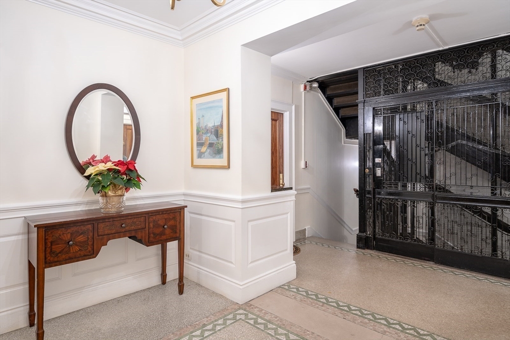 112 Pinckney Street, Unit 11 Boston, MA 02114 - Photo 2 of 16 a view of hall way with furniture