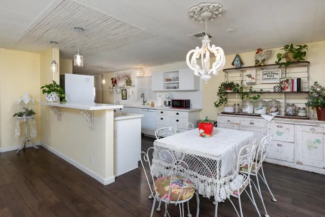 a bathroom with a sink double vanity and a mirror