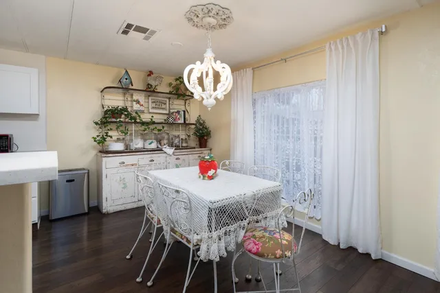 a bathroom with a toilet a sink and shower