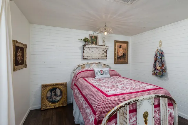 a view of a house with swimming pool and sitting area