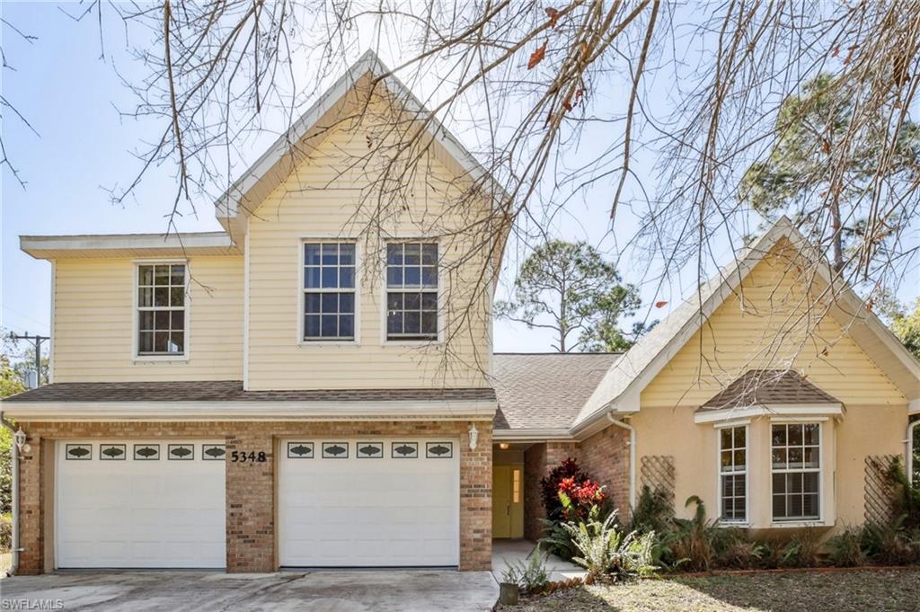 5348 Cypress Lane Naples, FL 34113 - Photo 3 of 28 a view of the house