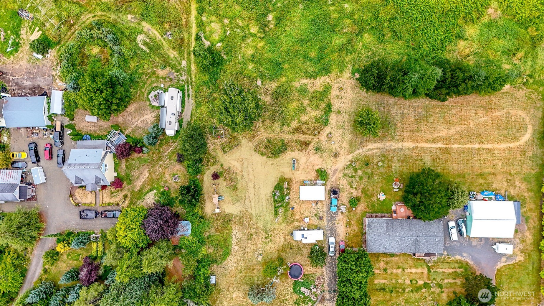 23 Garden Tracts Road Montesano, WA 98563 - Photo 1 of 22 an aerial view of residential house with outdoor space and trees all around