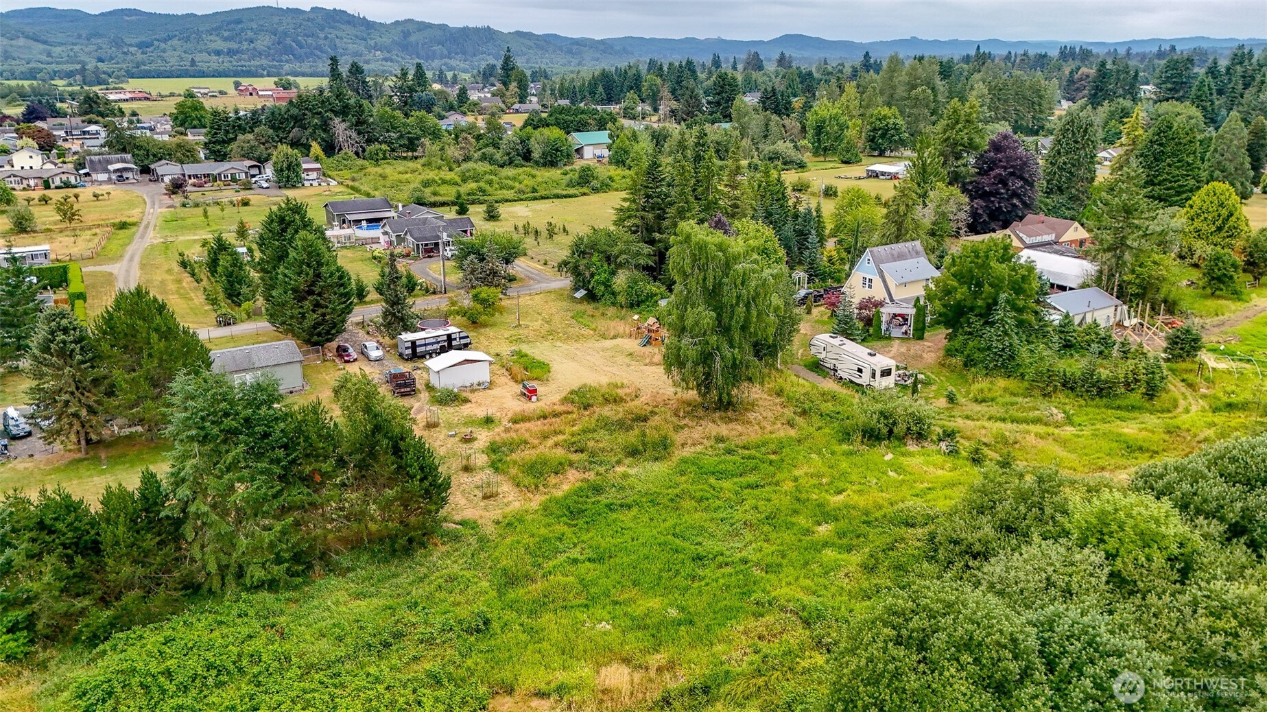 23 Garden Tracts Road Montesano, WA 98563 - Photo 7 of 22 an aerial view of residential house with parking space and city view