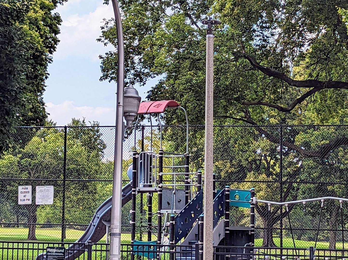 6730 South Ridgeland Avenue, Unit 2 Chicago, IL 60649 - Photo 11 of 12 a front view of a house with a tree