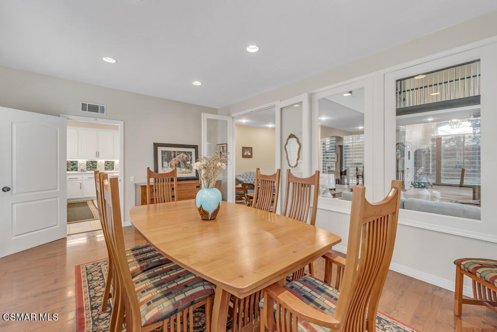 4372 Clearwood Road Moorpark, CA 93021 - Photo 15 of 51 a view of a dining room with furniture and wooden floor