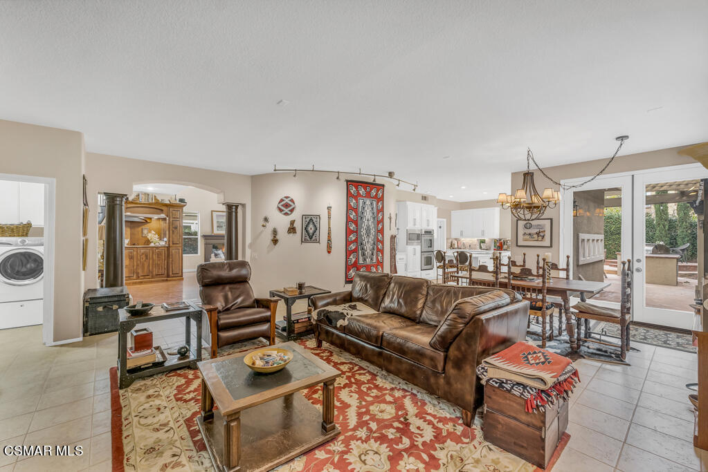 4372 Clearwood Road Moorpark, CA 93021 - Photo 16 of 51 a living room with furniture and a flat screen tv