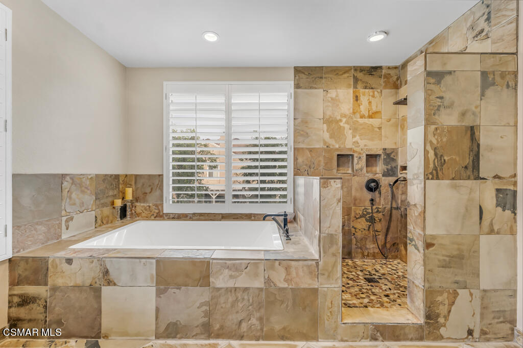 4372 Clearwood Road Moorpark, CA 93021 - Photo 33 of 51 a bathroom with a bathtub and a shower