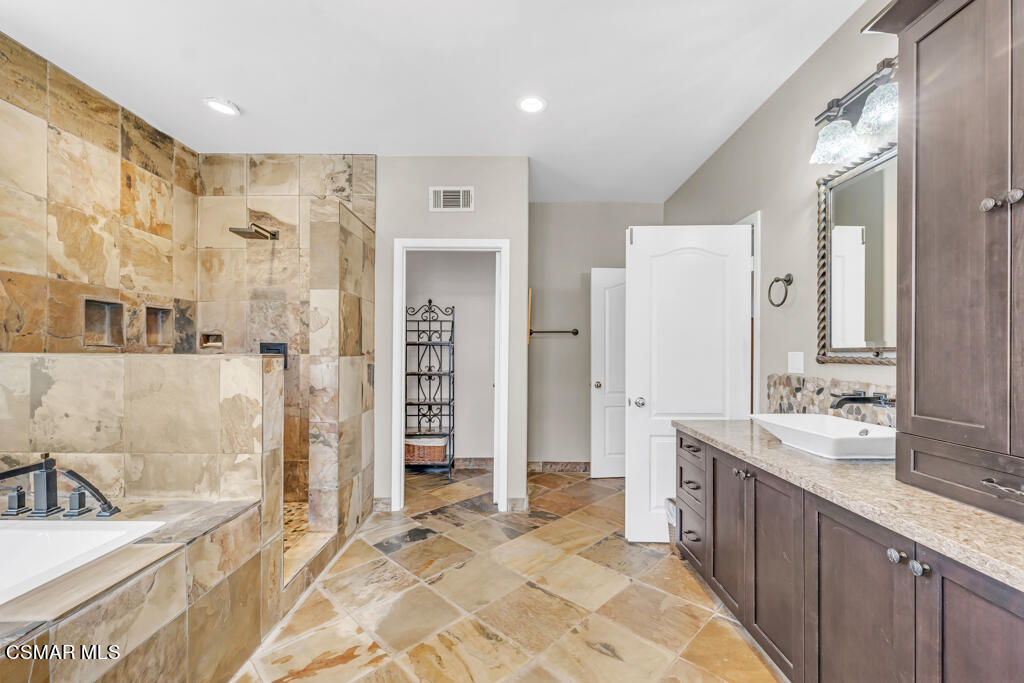 4372 Clearwood Road Moorpark, CA 93021 - Photo 34 of 51 a spacious bathroom with a double vanity sink mirror and shower
