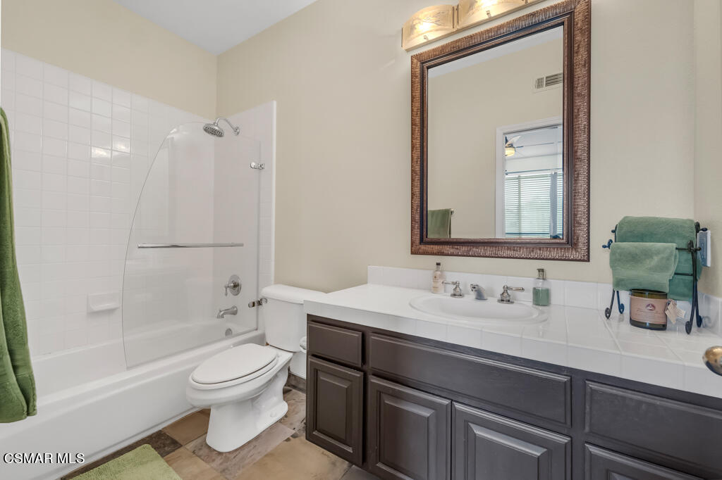 4372 Clearwood Road Moorpark, CA 93021 - Photo 41 of 51 a bathroom with a sink a toilet and shower