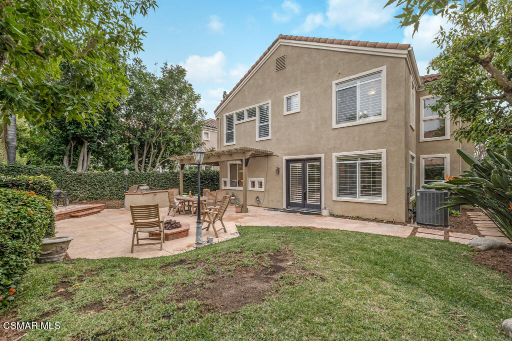 4372 Clearwood Road Moorpark, CA 93021 - Photo 48 of 51 a view of a house with a yard and sitting area