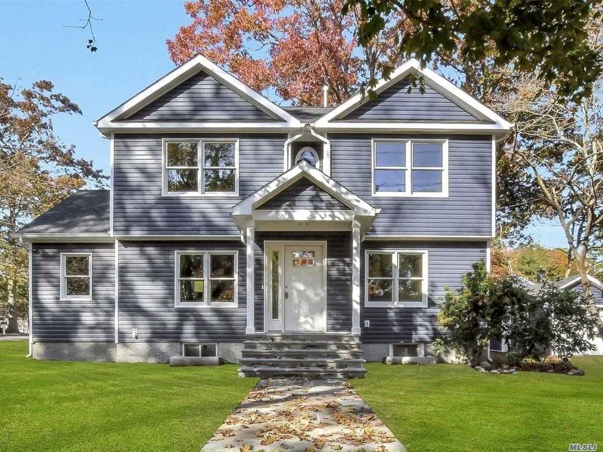 201 King Road Rocky Point, NY 11778 - Photo 1 of 1 a front view of a house with a yard