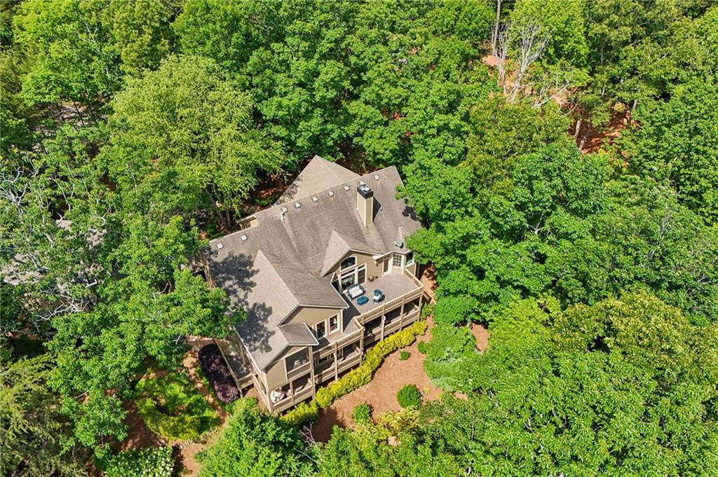 189 Red Trillium Ridge Big Canoe, GA 30143 - Photo 95 of 98 an aerial view of a house with a yard and trees all around