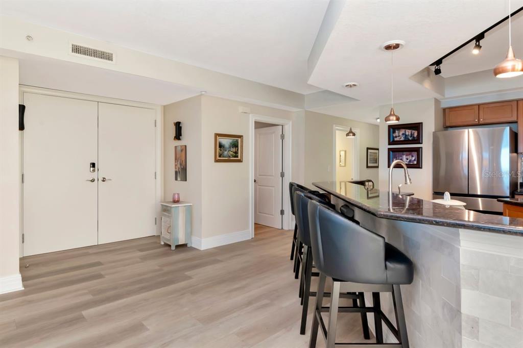 1350 Gulf Boulevard, Unit 301 Clearwater Beach, FL 33767 - Photo 14 of 75 a dining room with furniture and window