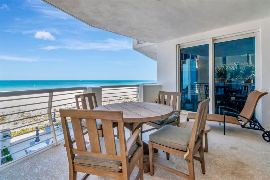 1350 Gulf Boulevard, Unit 301 Clearwater Beach, FL 33767 - Photo 36 of 75 a view of a dining room with furniture window and outside view