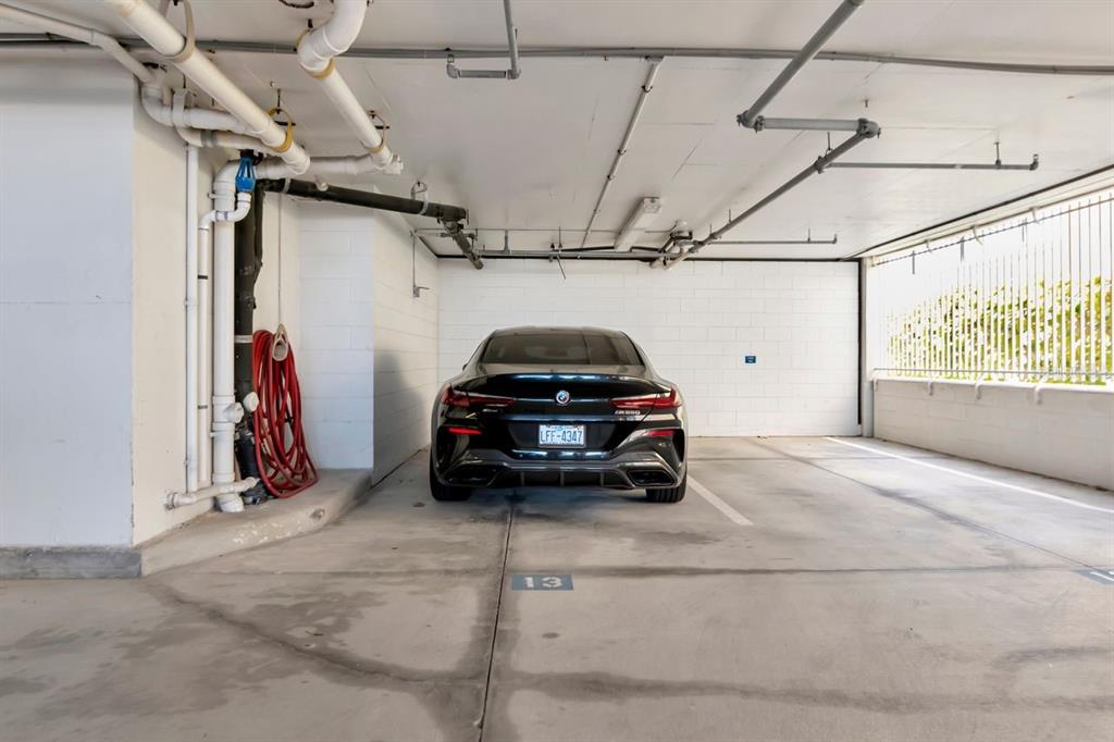 1350 Gulf Boulevard, Unit 301 Clearwater Beach, FL 33767 - Photo 4 of 75 a car parked in a garage