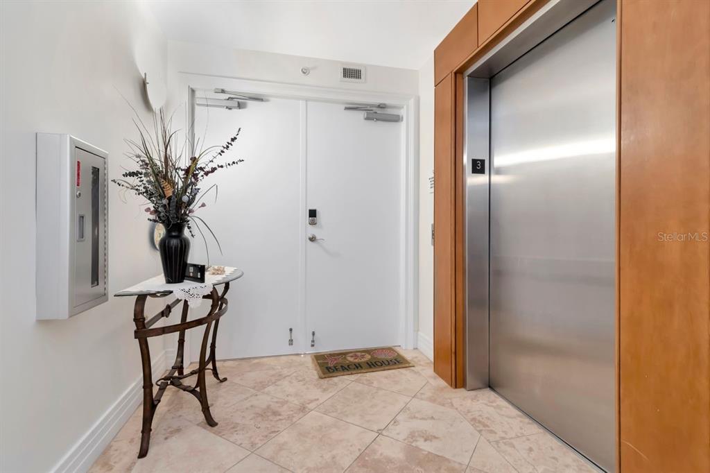 1350 Gulf Boulevard, Unit 301 Clearwater Beach, FL 33767 - Photo 10 of 75 a view of a room with table and a potted plant