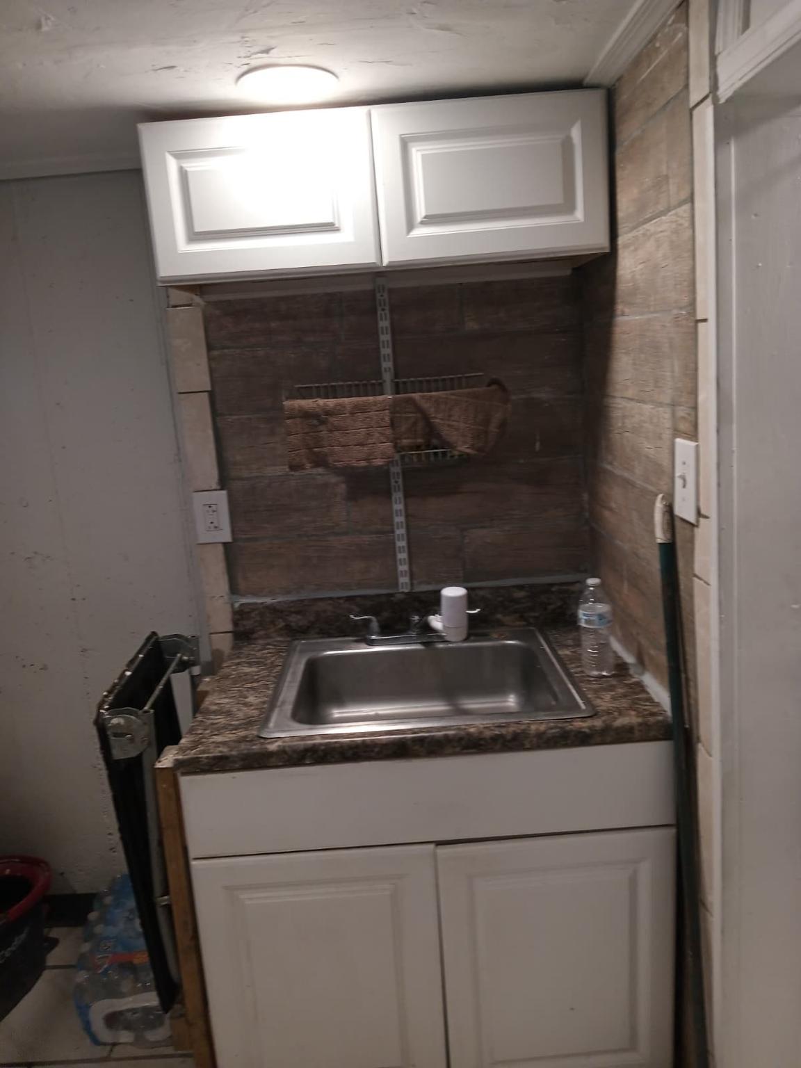 3419 Carter Lane Chester, PA 19013 - Photo 30 of 52 Studio - kitchenette with rustic charm.