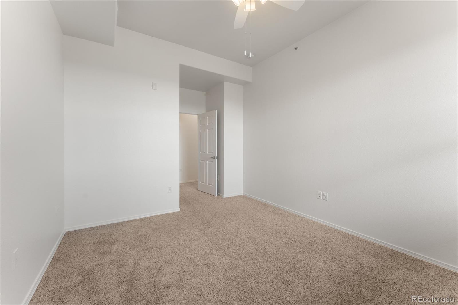 8420 Canyon Rim Trail, Unit 305 Parker, CO 80134 - Photo 20 of 44 a view of an empty room