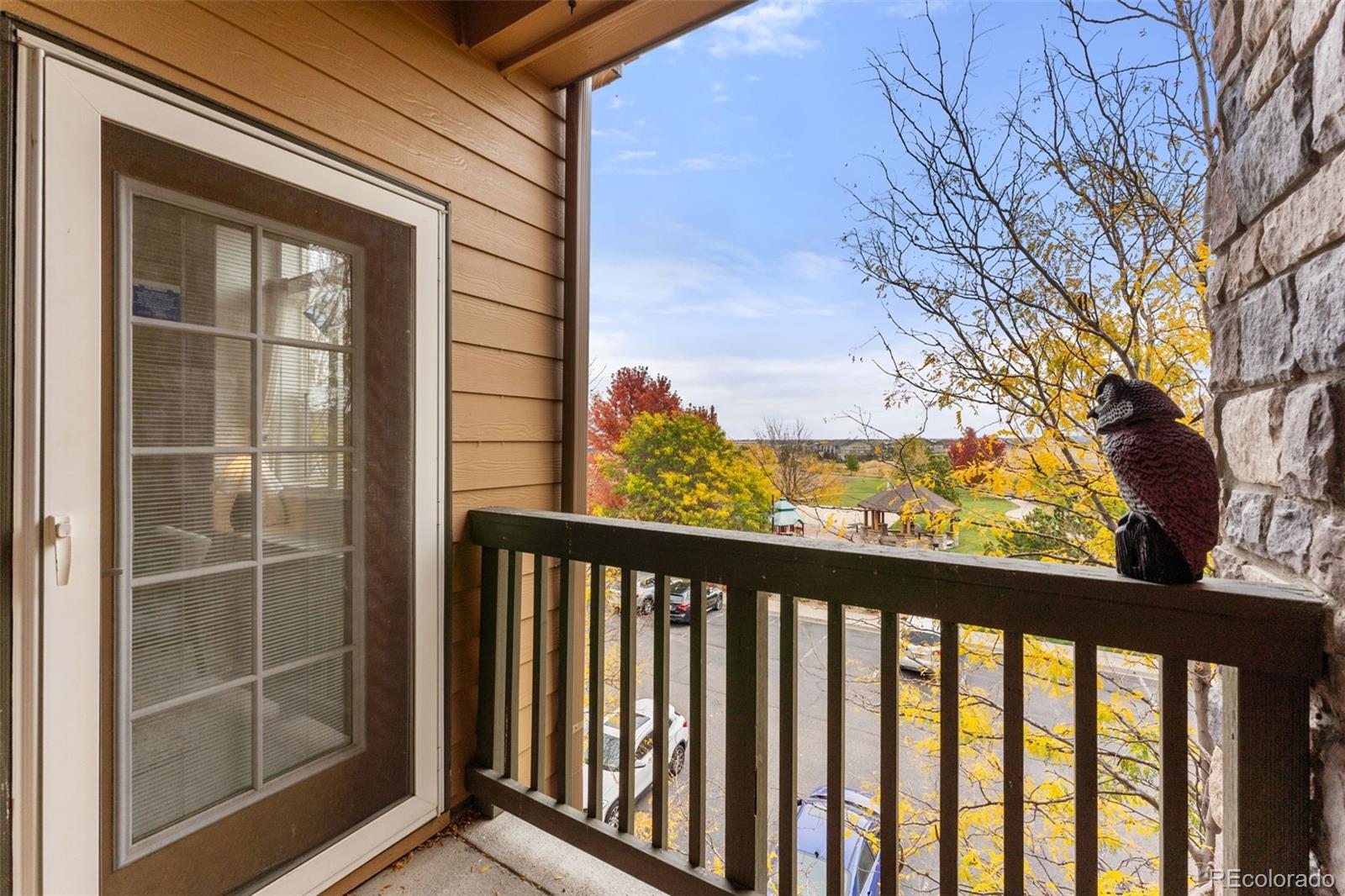 8420 Canyon Rim Trail, Unit 305 Parker, CO 80134 - Photo 23 of 44 a view of a balcony with a tree