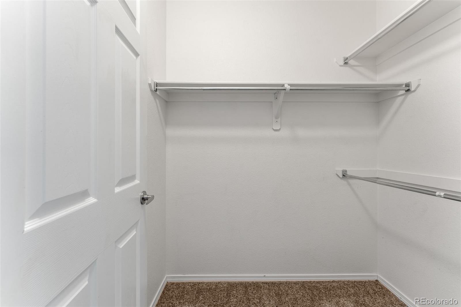 8420 Canyon Rim Trail, Unit 305 Parker, CO 80134 - Photo 41 of 44 a view of small space with racks on the wall