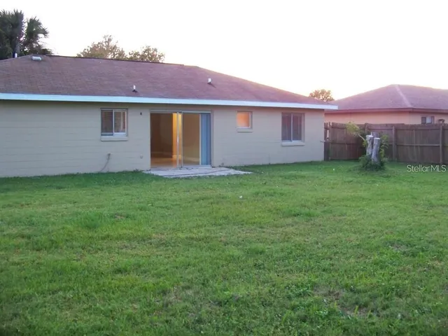 a view of a yard in front of a house