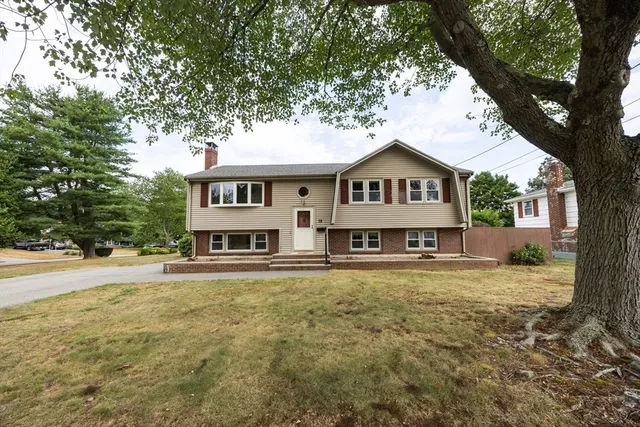 a front view of a house with a garage