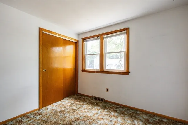 a bathroom with a sink and a window