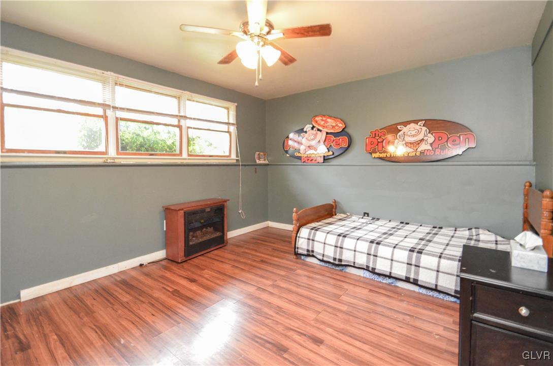 253 Sundance Road Effort, PA 18330 - Photo 13 of 25 a bedroom with furniture and a window