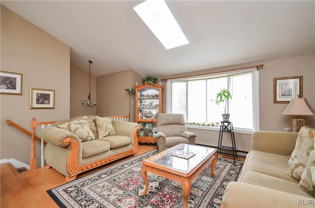253 Sundance Road Effort, PA 18330 - Photo 2 of 25 a living room with furniture rug and window