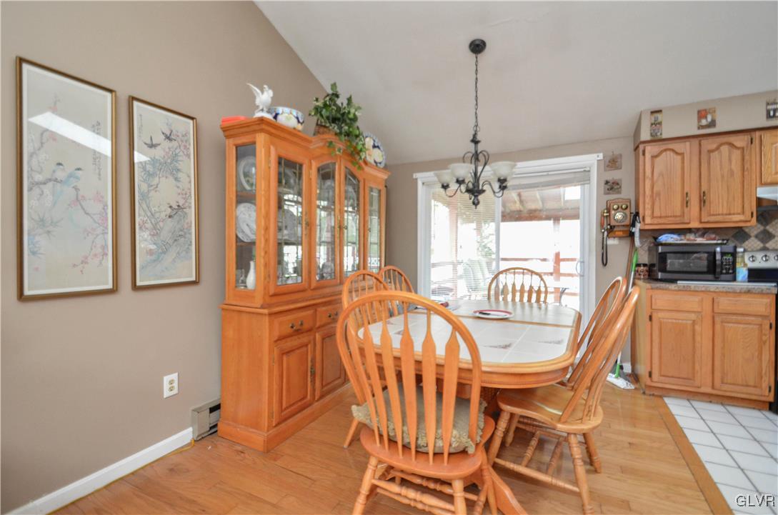 253 Sundance Road Effort, PA 18330 - Photo 4 of 25 a view of a dining room with furniture window and wooden floor
