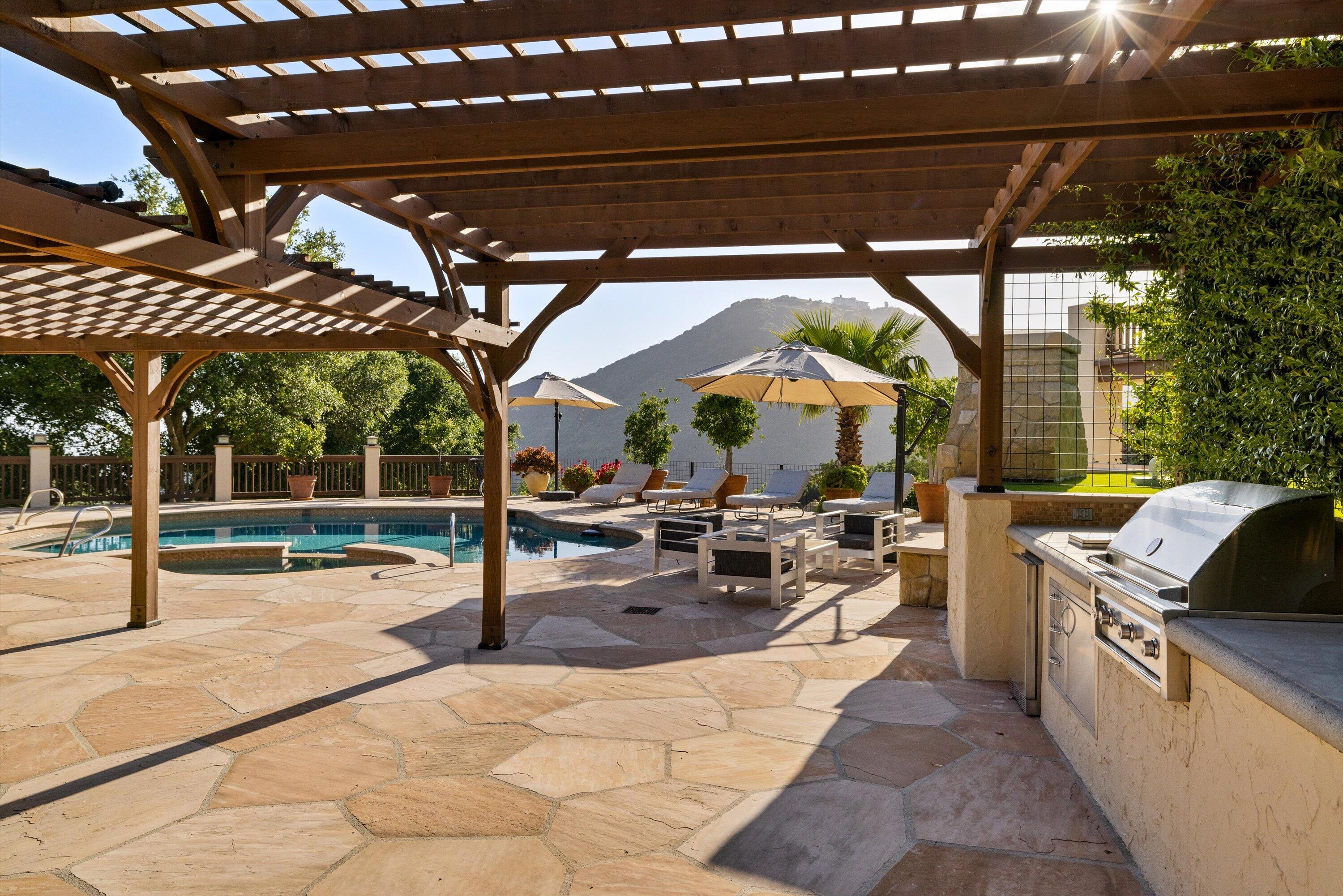 1090 Toro Canyon Road Santa Barbara, CA 93108 - Photo 13 of 59 a view of a porch with furniture