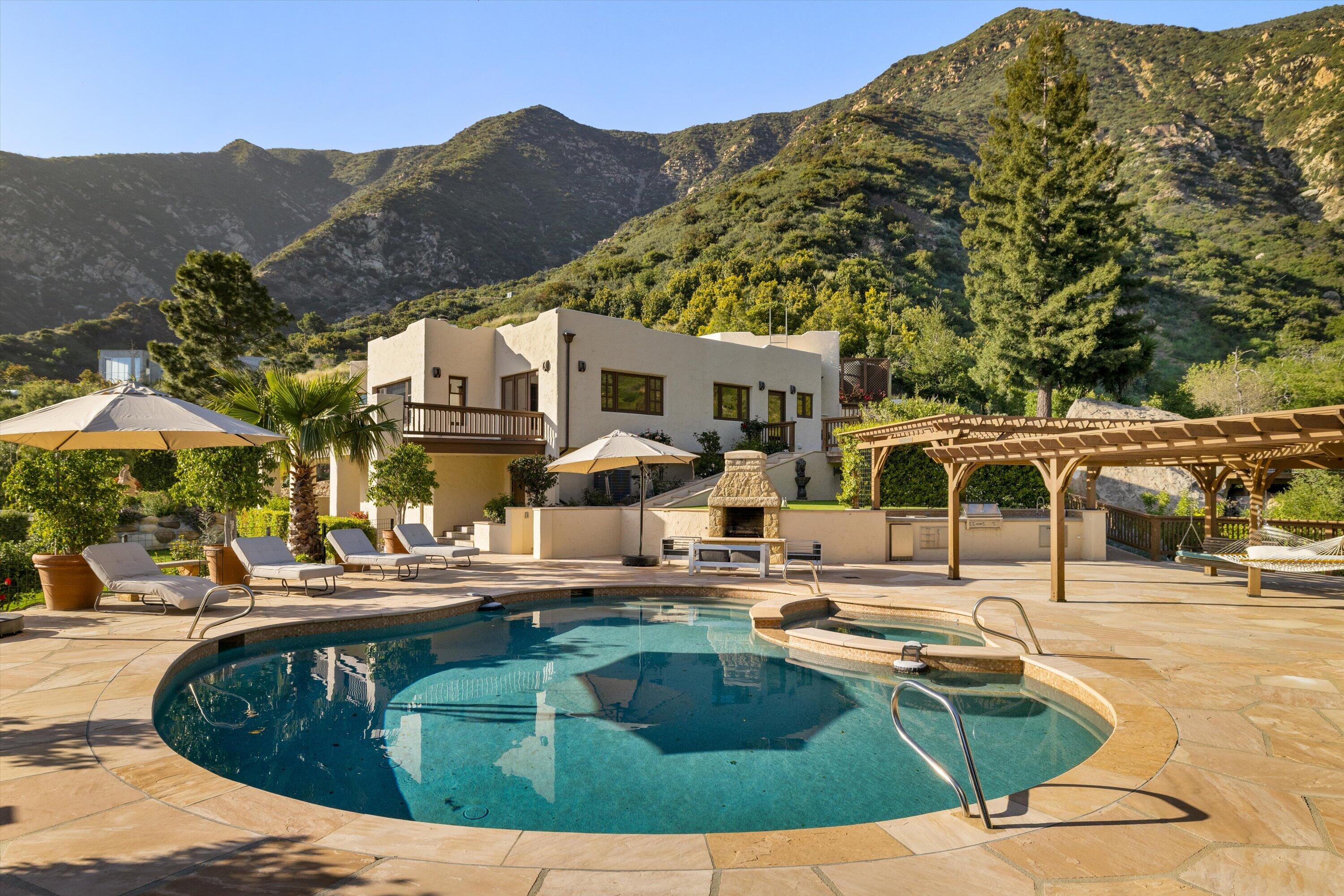 1090 Toro Canyon Road Santa Barbara, CA 93108 - Photo 9 of 59 a view of a swimming pool with a patio