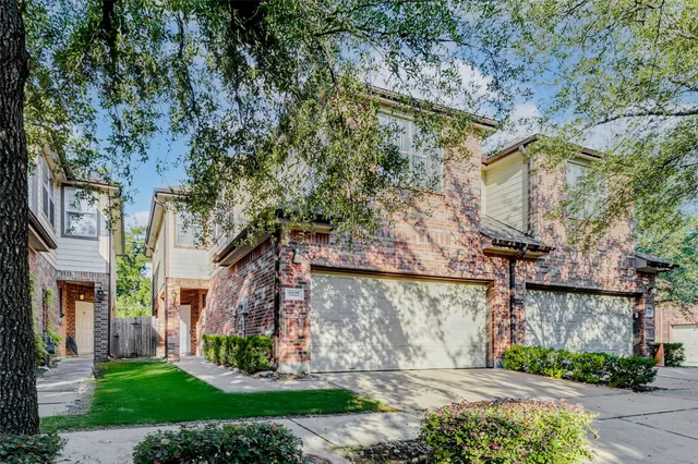 a view of a yard in front of a building