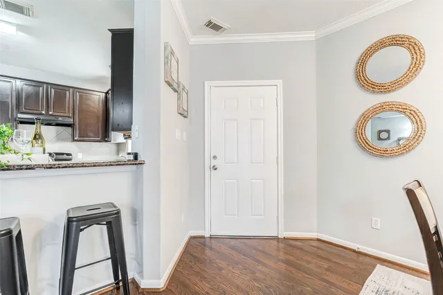 a view of bathroom with a sink and a mirror