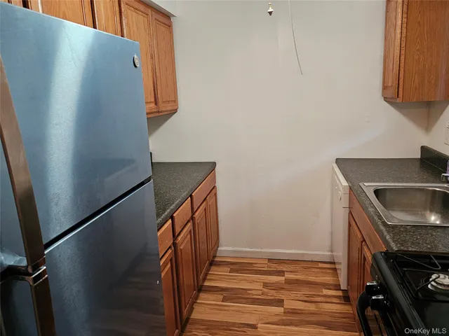 a view of a kitchen with washer and dryer