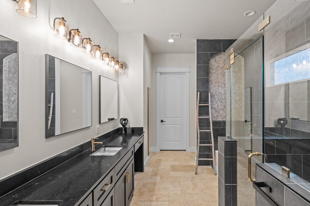 661 Emerald Loop Fredericksburg, TX 78624 - Photo 30 of 73 Primary bathroom