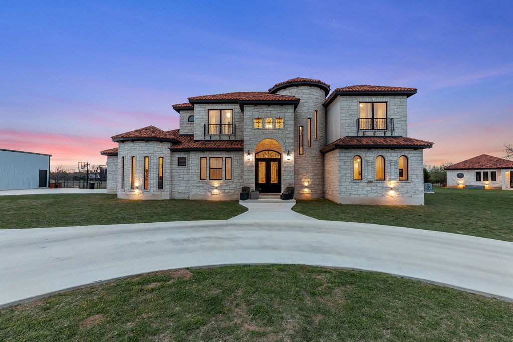 661 Emerald Loop Fredericksburg, TX 78624 - Photo 73 of 73 Front view at dusk