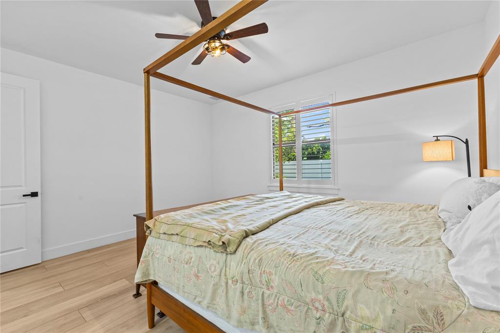 6810 Church Street Jupiter, FL 33458 - Photo 17 of 39 a bedroom with a bed and a window