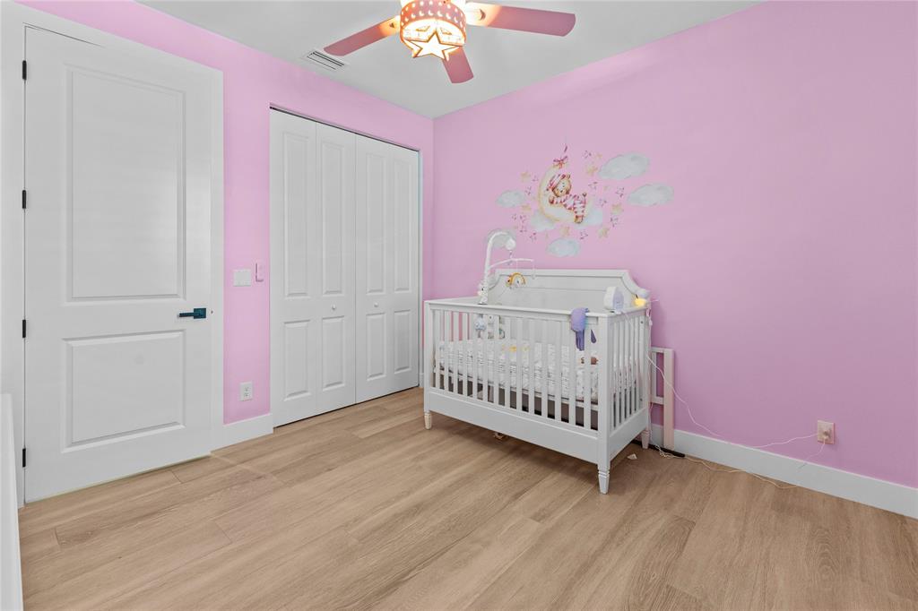 6810 Church Street Jupiter, FL 33458 - Photo 23 of 39 a view of a room with wooden floor