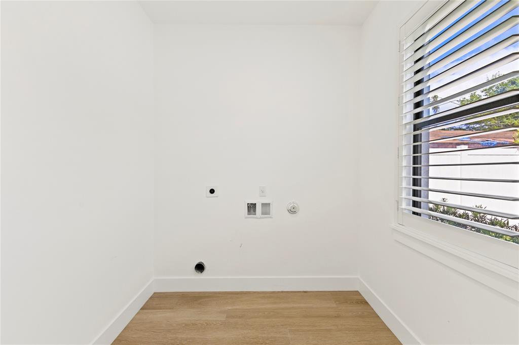 6810 Church Street Jupiter, FL 33458 - Photo 27 of 39 a view of a room with wooden floor