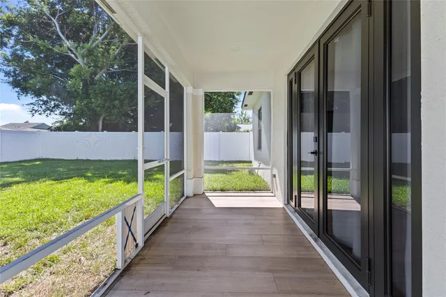 a view of an entryway with garden