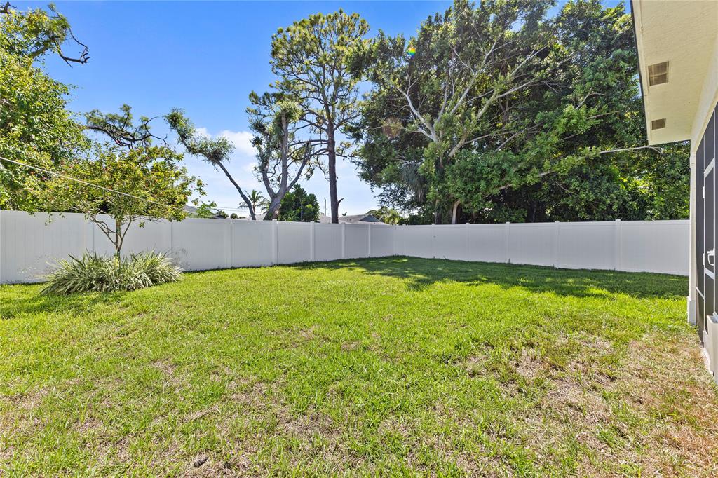 6810 Church Street Jupiter, FL 33458 - Photo 30 of 39 a view of backyard with green space