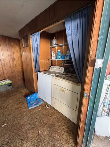 a living room with lots of furniture and gym equipment