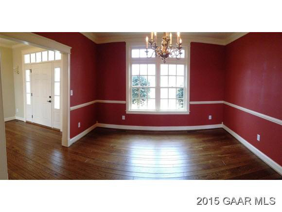 579 Shirey Road Swoope, VA 24479 - Photo 12 of 36 a room with wooden floor and windows