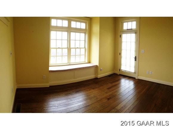 579 Shirey Road Swoope, VA 24479 - Photo 15 of 36 a room with wooden floor and windows