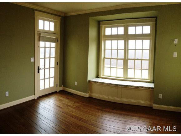 579 Shirey Road Swoope, VA 24479 - Photo 19 of 36 a view of an empty room with wooden floor and a window