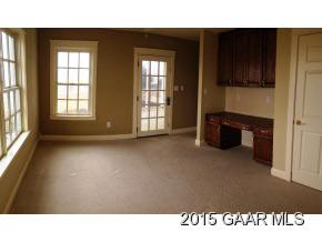 579 Shirey Road Swoope, VA 24479 - Photo 29 of 36 a open hall with a cabinet and a flat screen tv